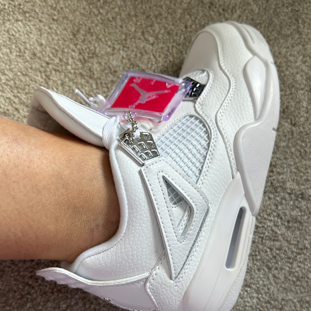 Jordan White Leather Retro Sneaker with Pink Jumpman Tag